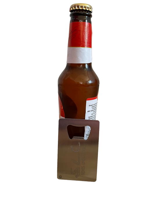 Bottle of lager and bottle opener